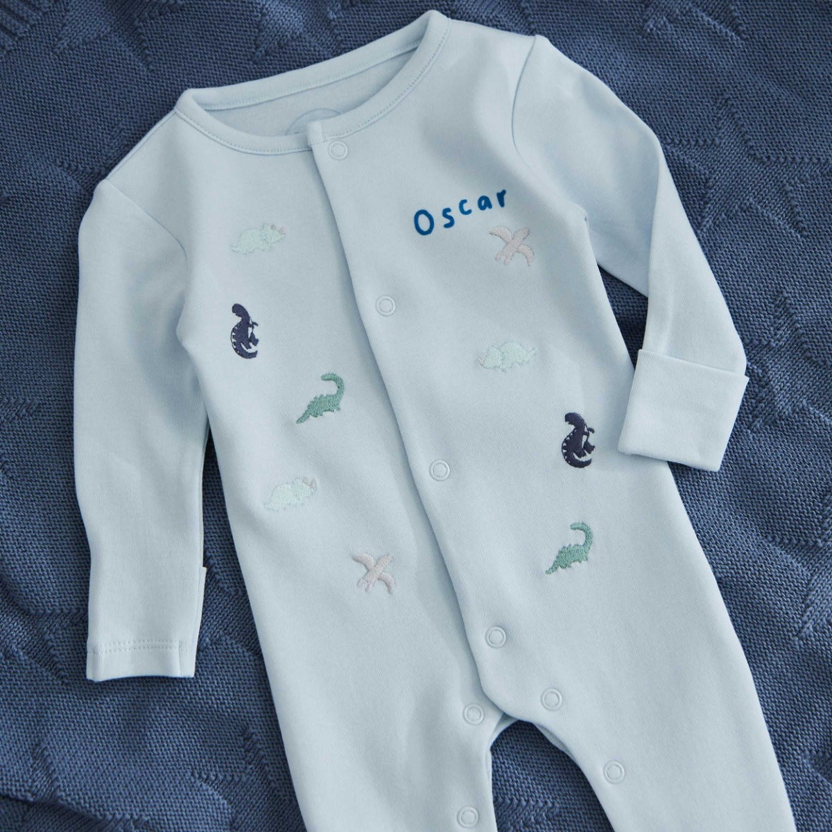 Personalised Blue Dinosaur Sleepsuit