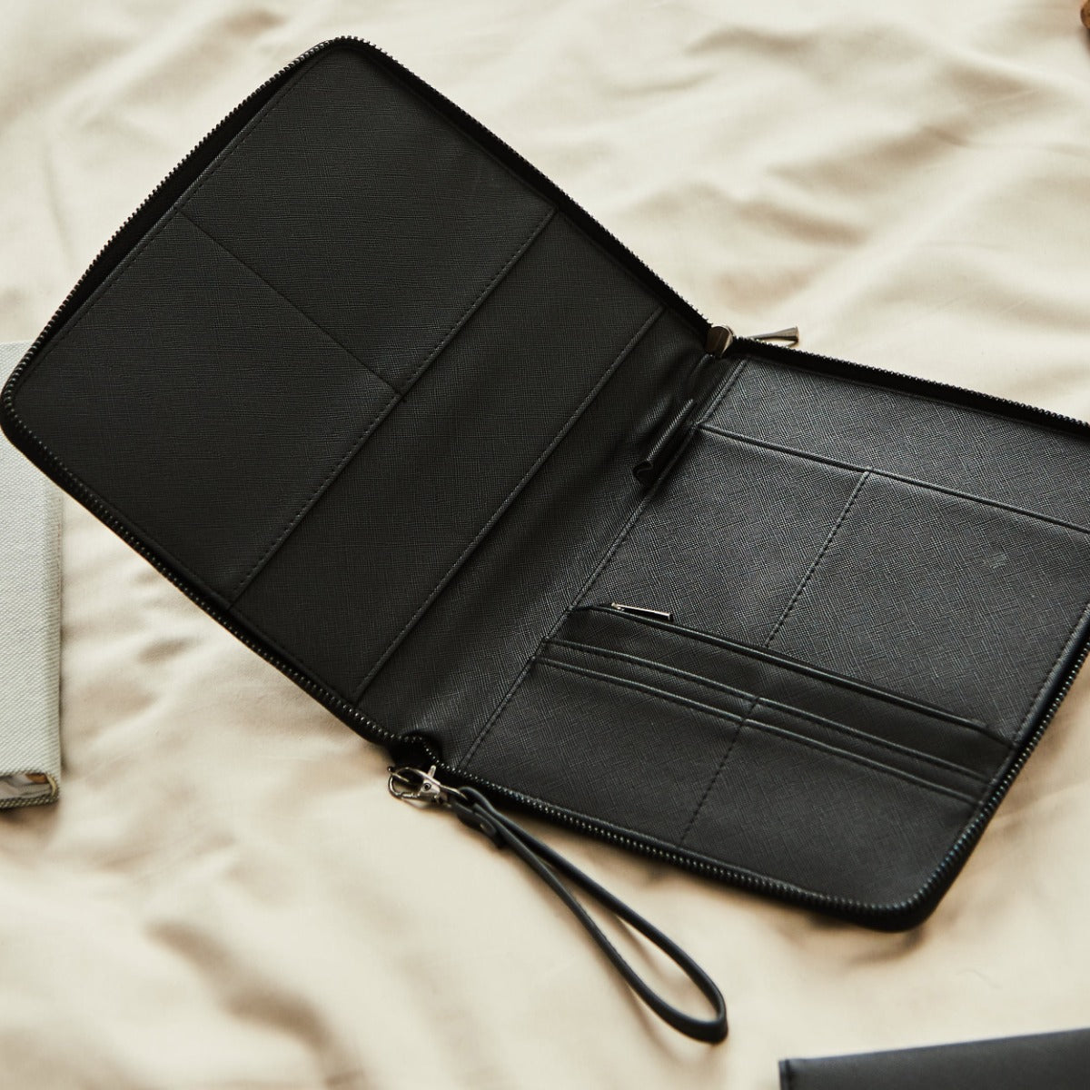 Personalised Embossed Travel Case in Black by Made Yours