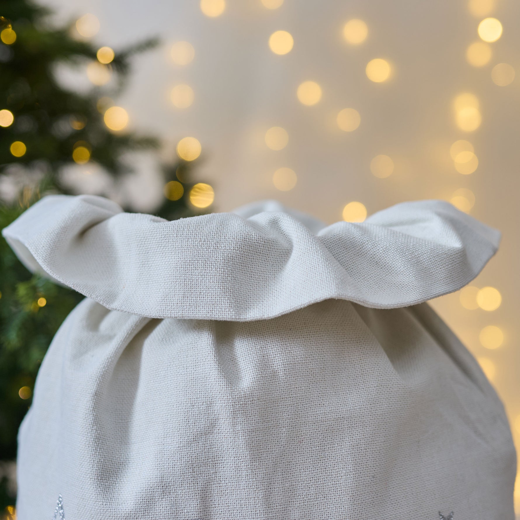 Personalised The Snowman™ and Snowdog Cream Christmas Sack