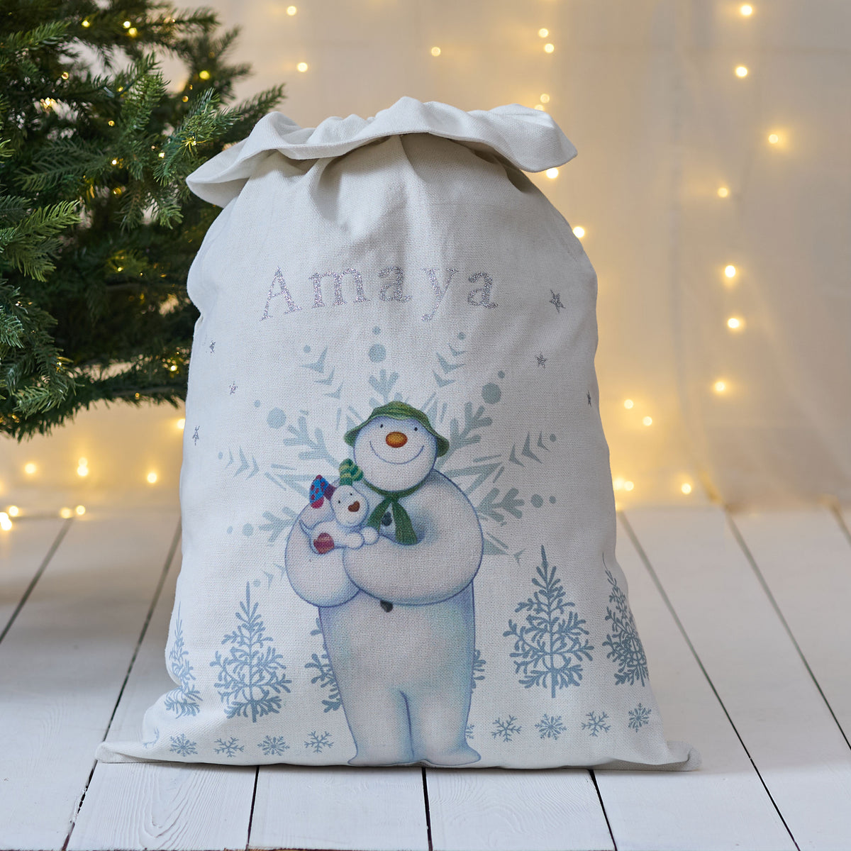 Personalised The Snowman™ and Snowdog Cream Christmas Sack
