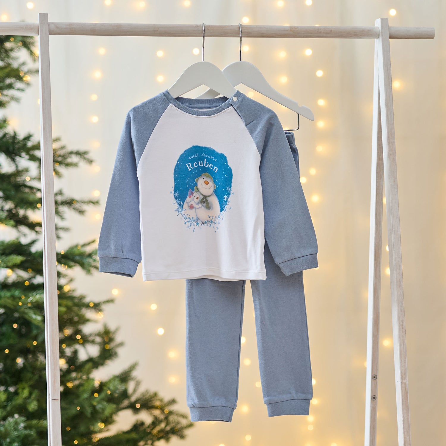 Personalised The Snowman™ and Snowdog Blue Jersey Pyjamas