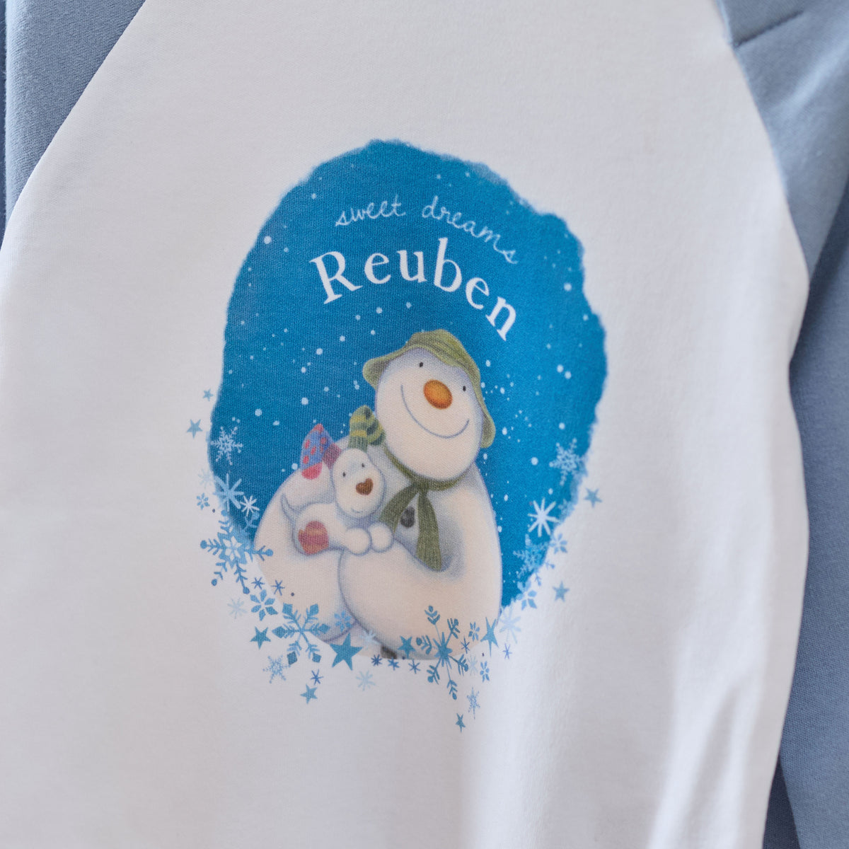 Personalised The Snowman™ and Snowdog Blue Jersey Pyjamas