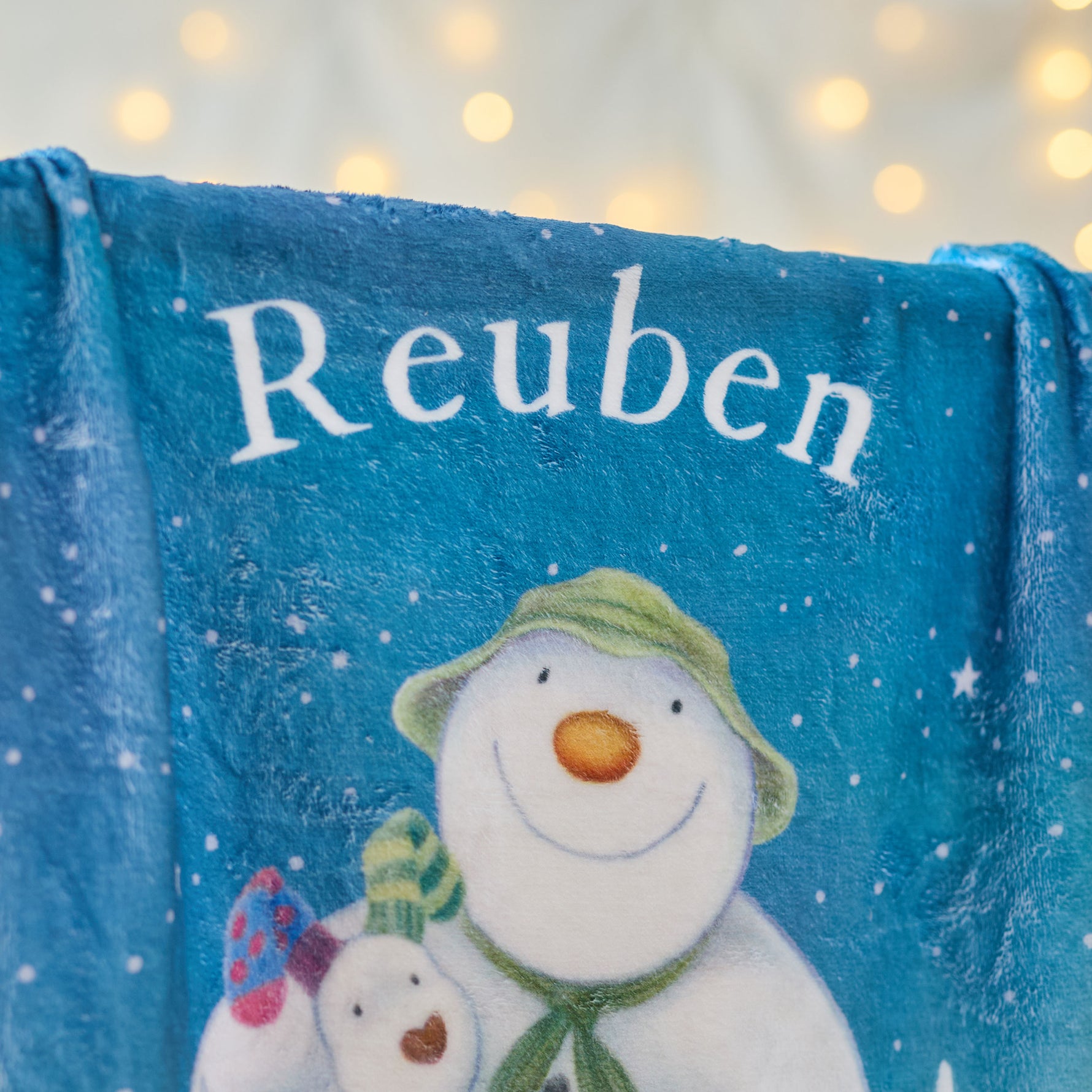 Personalised The Snowman™ and Snowdog Fleece Blanket