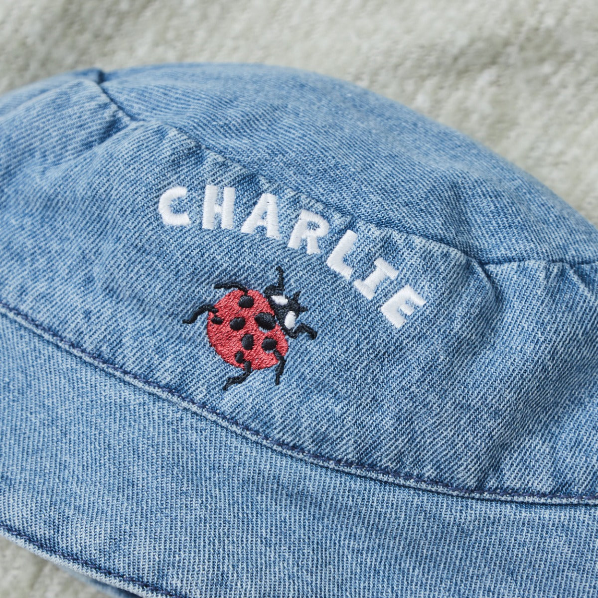 Personalised Natural History Museum™ Ladybird Bucket Hat 