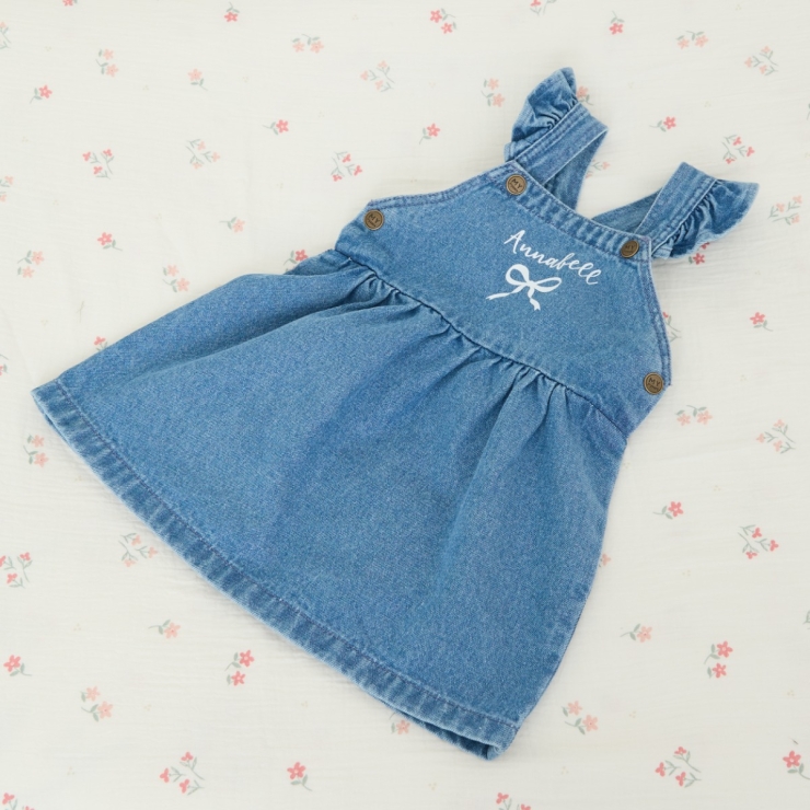 WHITE BOW DENIM PINNY DRESS