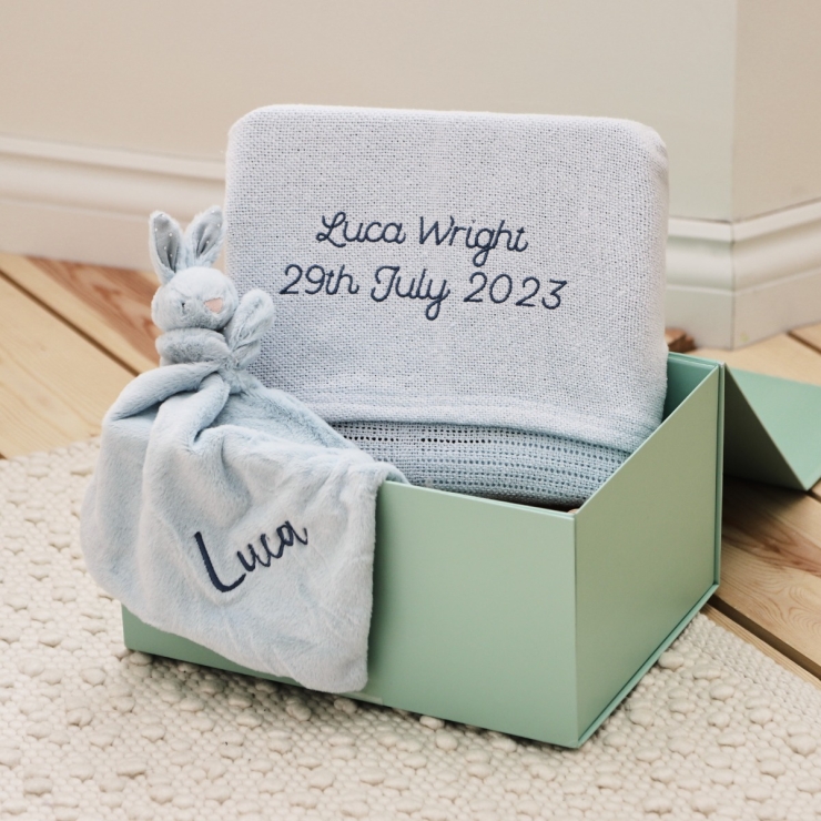 Blue baby blanket and bunny comforter